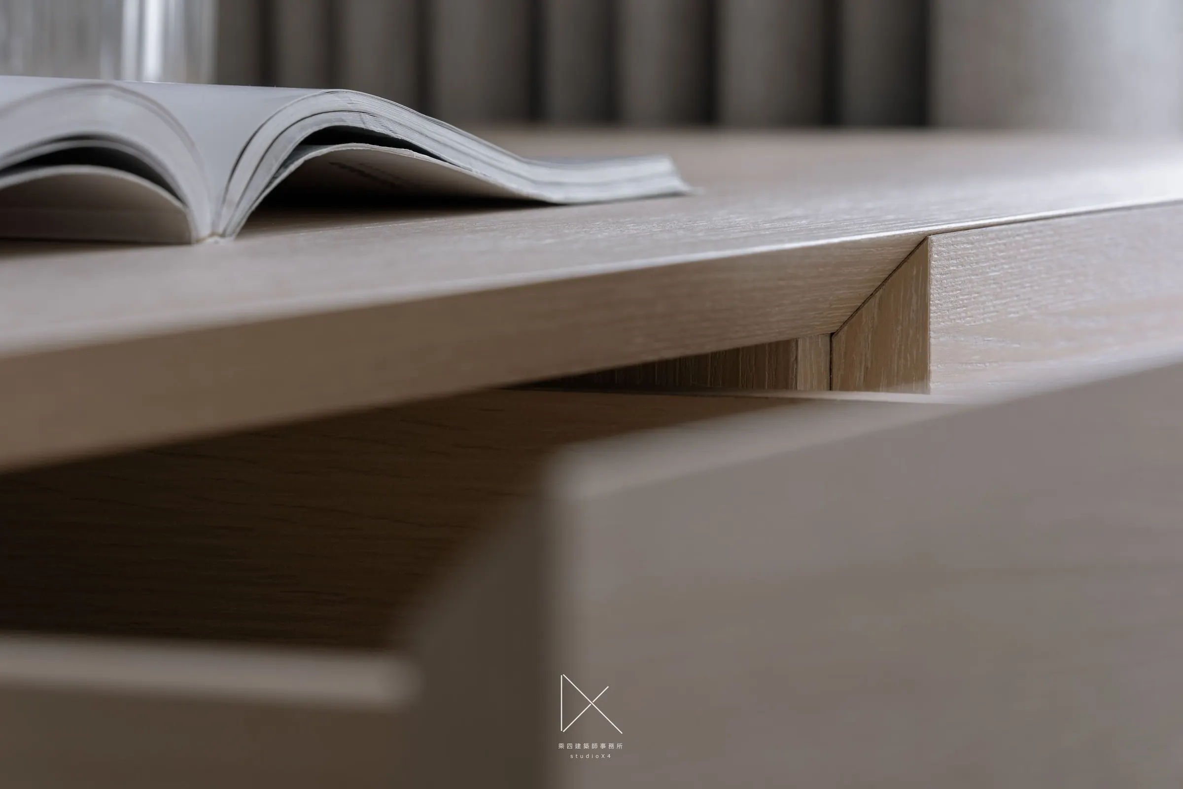 Desk-edge joinery and wardrobe interior — craft at its smallest scale.